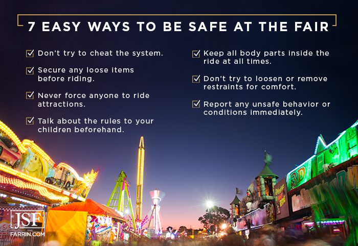 Rides and vendors lit up at night at the North Carolina State Fair.