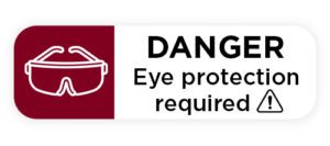 Warning label to wear eye protection.