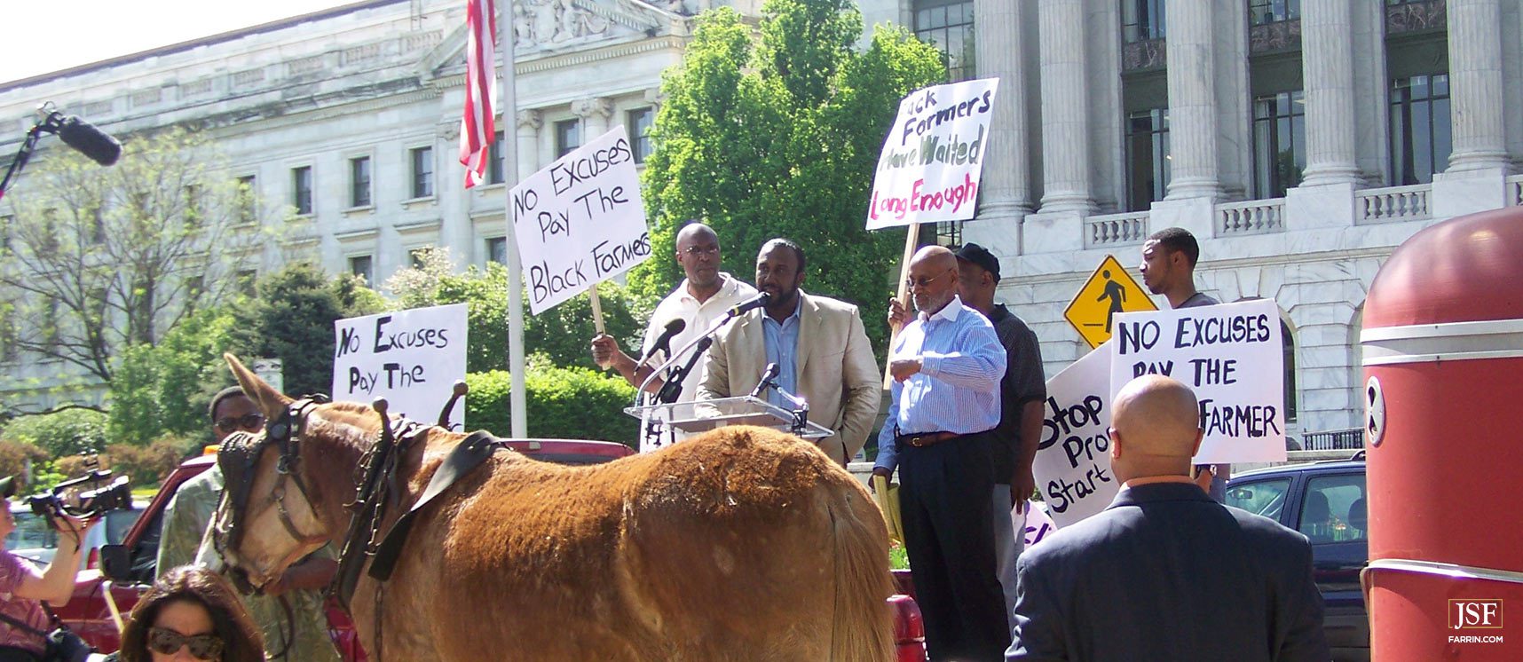 John Boyd, Jr., speaking in front of the Department of Agriculture in Washington, DC at a Black Farmers rally.