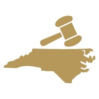 Gold icon of the state of North Carolina and a judge's gavel.