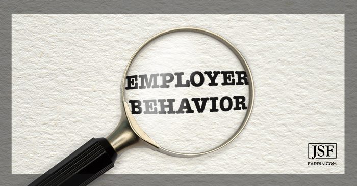A magnifying glass focusing on the words Employer Behavior.