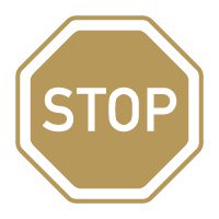 ALT TEXT: A traffic stop sign in gold.