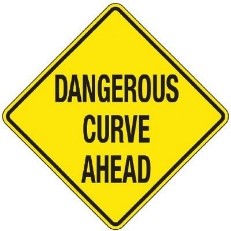 Yellow dangerous curve ahead diamond road sign