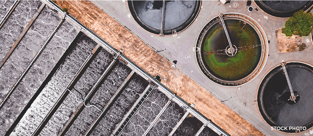 Drone view of the filtration tanks at a waste water treatment facility.