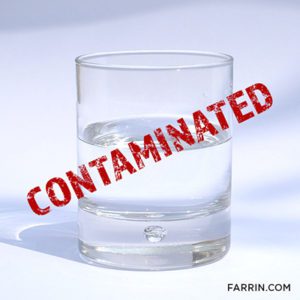 A contaminated glass of water.
