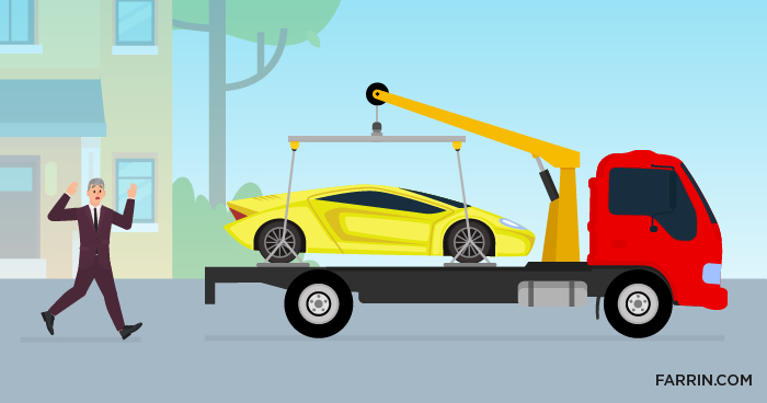 A rich man's luxury sports car being towed away.