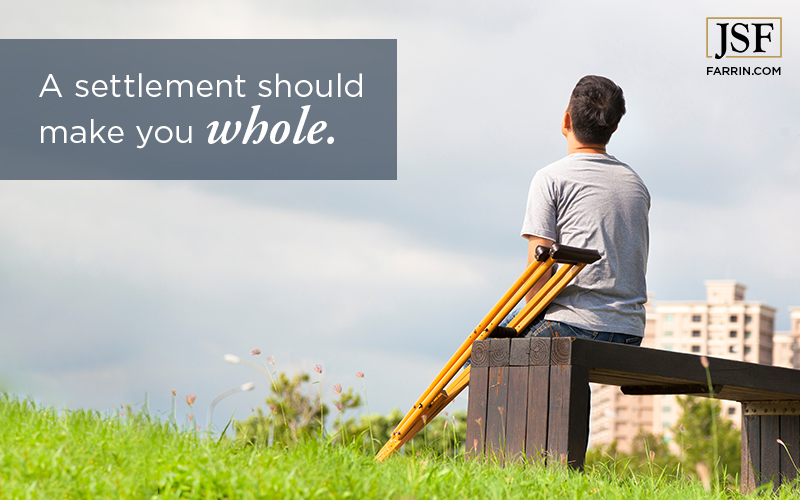 A man sitting & relaxing on a park bench with a pair of crutches. A settlement should make you whole.