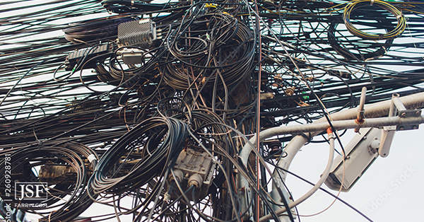 A mess of wires representing organizational gridlock.