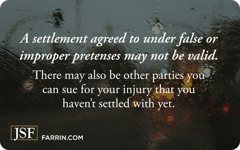 A settlement agreed to under false pretenses may not be valid. Rain drops blurring the view from a car windshield.